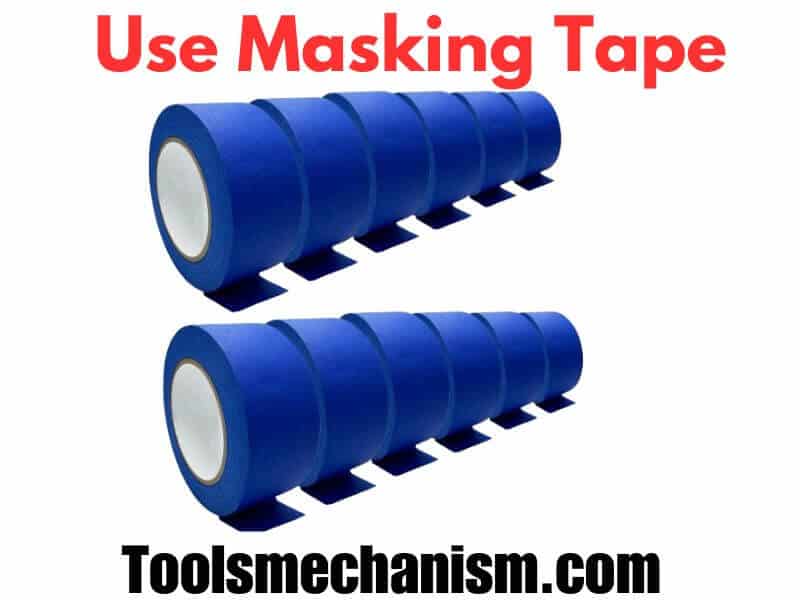 Applying blue masking tape on the surface is a critical step in how to drill fiberglass without cracking guide.